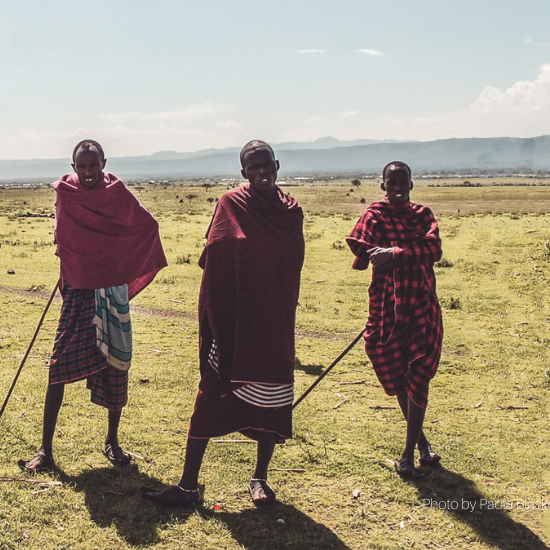 Four Masai men - Photo by Paola Blašković on Unsplash