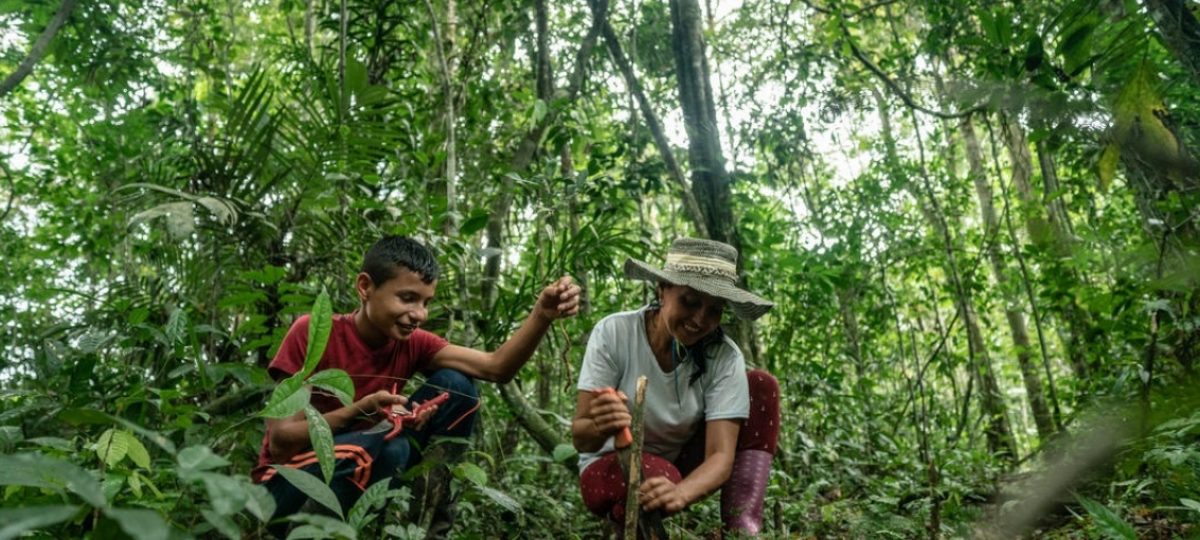 Woman and child in forest
